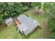 Aerial view of the home showcasing the back deck and surrounding greenery at 1904 Britt Dr, Snellville, GA 30078
