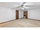 Basement area with neutral carpet and an open layout at 1904 Britt Dr, Snellville, GA 30078