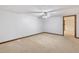 Large basement area with neutral carpet and an open layout, ready for customization at 1904 Britt Dr, Snellville, GA 30078