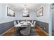 Chic dining room featuring a modern table set, chandelier, and stylish artwork at 1904 Britt Dr, Snellville, GA 30078