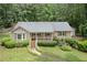 Charming single-story home with a well-maintained front yard and inviting porch at 1904 Britt Dr, Snellville, GA 30078
