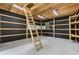 Interior space with ladder and exposed beams at 1904 Britt Dr, Snellville, GA 30078