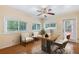 Bright office space with two windows, a ceiling fan, and a desk for working from home at 1904 Britt Dr, Snellville, GA 30078