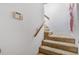 Carpeted staircase leading to the upper level of the home at 1904 Britt Dr, Snellville, GA 30078
