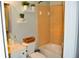 Bright bathroom features updated vanity and mirror, decorative shelving with plants, and tile tub surround at 1951 Barrett Knoll Nw Cir, Kennesaw, GA 30152