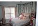 Cozy bedroom with natural light, adorned with unique decorations and ample space at 1951 Barrett Knoll Nw Cir, Kennesaw, GA 30152