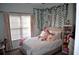 Cozy bedroom decorated with soft decor and natural light at 1951 Barrett Knoll Nw Cir, Kennesaw, GA 30152