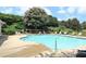 Community pool with plenty of seating for residents to enjoy on a sunny day at 1951 Barrett Knoll Nw Cir, Kennesaw, GA 30152