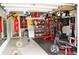 Garage transformed into a home gym with weights, punching bag, and motivational decor at 1951 Barrett Knoll Nw Cir, Kennesaw, GA 30152