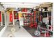 Garage setup as a home gym with weights, punching bag, mirror and athletic decor at 1951 Barrett Knoll Nw Cir, Kennesaw, GA 30152