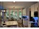 Modern kitchen featuring granite countertops, stainless steel appliances, and a breakfast nook at 1951 Barrett Knoll Nw Cir, Kennesaw, GA 30152