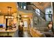 Open living space view of the kitchen and staircase with natural light at 1951 Barrett Knoll Nw Cir, Kennesaw, GA 30152