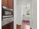 Conveniently located butler's pantry featuring a built-in microwave and ample counter space at 6440 Westchester Pl, Cumming, GA 30040