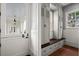 Bright mudroom with custom built-in storage cabinets, drawers and a bench seat perfect for organization at 6440 Westchester Pl, Cumming, GA 30040