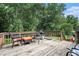 Spacious deck features outdoor seating, ideal for relaxation and entertaining at 8605 Stone Creek Ct, Douglasville, GA 30135