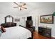 Bedroom boasts gleaming hardwood floors and ample closet space at 8605 Stone Creek Ct, Douglasville, GA 30135