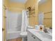 Bathroom featuring a vanity, toilet, and tiled shower/tub area with neutral decor at 3221 Abbott Dr # 5, Powder Springs, GA 30127