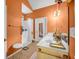 Bathroom featuring a walk-in shower, white vanity, orange wall, and tile flooring at 3221 Abbott Dr # 5, Powder Springs, GA 30127