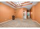 Open bedroom featuring a tray ceiling, with an open door to the Primary bath and dressing area at 3221 Abbott Dr # 5, Powder Springs, GA 30127