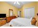 Cozy bedroom featuring carpet, white bedding, dresser, and a large window at 3221 Abbott Dr # 5, Powder Springs, GA 30127
