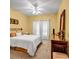 Bedroom with a bed, beige carpet, neutral walls, and a large window with sheer curtains at 3221 Abbott Dr # 5, Powder Springs, GA 30127