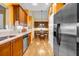 Well-lit kitchen featuring stainless steel appliances and orange walls at 3221 Abbott Dr # 5, Powder Springs, GA 30127