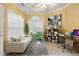 Bright living room with large windows, neutral sofa, and ceiling fan at 3221 Abbott Dr # 5, Powder Springs, GA 30127