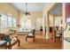 Bright living room with hardwood floors, a ceiling fan, and large windows at 3221 Abbott Dr # 5, Powder Springs, GA 30127