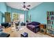 Well-lit office space with a desk, couch, and shelving, perfect for working from home at 3221 Abbott Dr # 5, Powder Springs, GA 30127