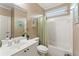 Cozy bathroom featuring a shower/tub combo, neutral walls, and ample space at 412 Mill Stream Way, Woodstock, GA 30188