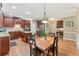 Spacious kitchen with a center island, breakfast area, and stainless steel appliances at 412 Mill Stream Way, Woodstock, GA 30188