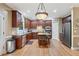 Well-equipped kitchen with stainless steel appliances, granite countertops, and a center island at 412 Mill Stream Way, Woodstock, GA 30188