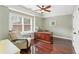Comfortable office space with a large window and wood floors at 412 Mill Stream Way, Woodstock, GA 30188