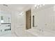 Well-lit bathroom with double sinks, spacious vanity, and contemporary fixtures at 5602 Asheforde Ln, Marietta, GA 30068