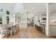 Sunlit eat-in kitchen with hardwood floors and easy access to the patio at 5602 Asheforde Ln, Marietta, GA 30068