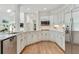 Well-appointed kitchen with white cabinets, stainless steel appliances, and granite countertops at 5602 Asheforde Ln, Marietta, GA 30068