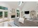 Light-filled living room with fireplace, built-in cabinets, and access to a private deck at 5602 Asheforde Ln, Marietta, GA 30068