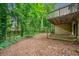 View of the lush backyard and deck space, offering a serene outdoor retreat at 766 Lost Creek Cir, Stone Mountain, GA 30088