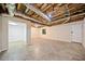 Spacious basement with tile flooring, exposed ceiling and ductwork, and white painted walls at 766 Lost Creek Cir, Stone Mountain, GA 30088