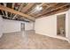Spacious basement featuring tile floors and several open doorways at 766 Lost Creek Cir, Stone Mountain, GA 30088