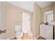 Cozy bathroom featuring a walk-in shower, single vanity, and toilet at 766 Lost Creek Cir, Stone Mountain, GA 30088