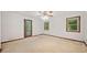 Bright bedroom with lots of sunlight, neutral walls, ceiling fan, and trim at 766 Lost Creek Cir, Stone Mountain, GA 30088