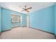 Light-filled bedroom with a ceiling fan and a window offering natural light at 766 Lost Creek Cir, Stone Mountain, GA 30088
