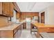 Kitchen with stainless steel appliances and wood cabinets at 766 Lost Creek Cir, Stone Mountain, GA 30088