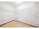 Walk-in closet with white walls, neutral carpet, and metal wire shelving at 766 Lost Creek Cir, Stone Mountain, GA 30088