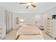 A Primary bedroom with a light color scheme and lots of storage at 130 Sunnybrook Ln, Woodstock, GA 30188