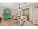 Dining room area includes an open floor plan and views to backyard at 130 Sunnybrook Ln, Woodstock, GA 30188