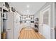 Bright kitchen with stainless steel appliances, subway tile, and stylish cabinets at 130 Sunnybrook Ln, Woodstock, GA 30188