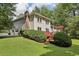 Well-maintained backyard with a deck and a spacious lawn, perfect for outdoor activities at 1487 W Bend Creek Ct, Atlanta, GA 30338