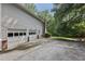 Spacious two-car garage with ample parking space and an extended driveway at 1487 W Bend Creek Ct, Atlanta, GA 30338